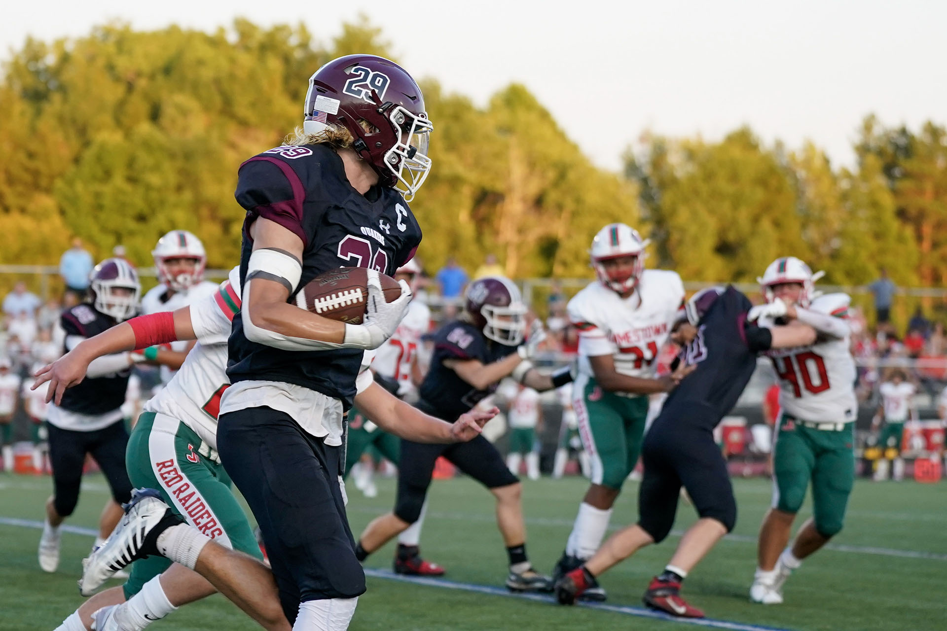 Running around the corner trying to get to the endzone Running around the corner trying to get to the endzone