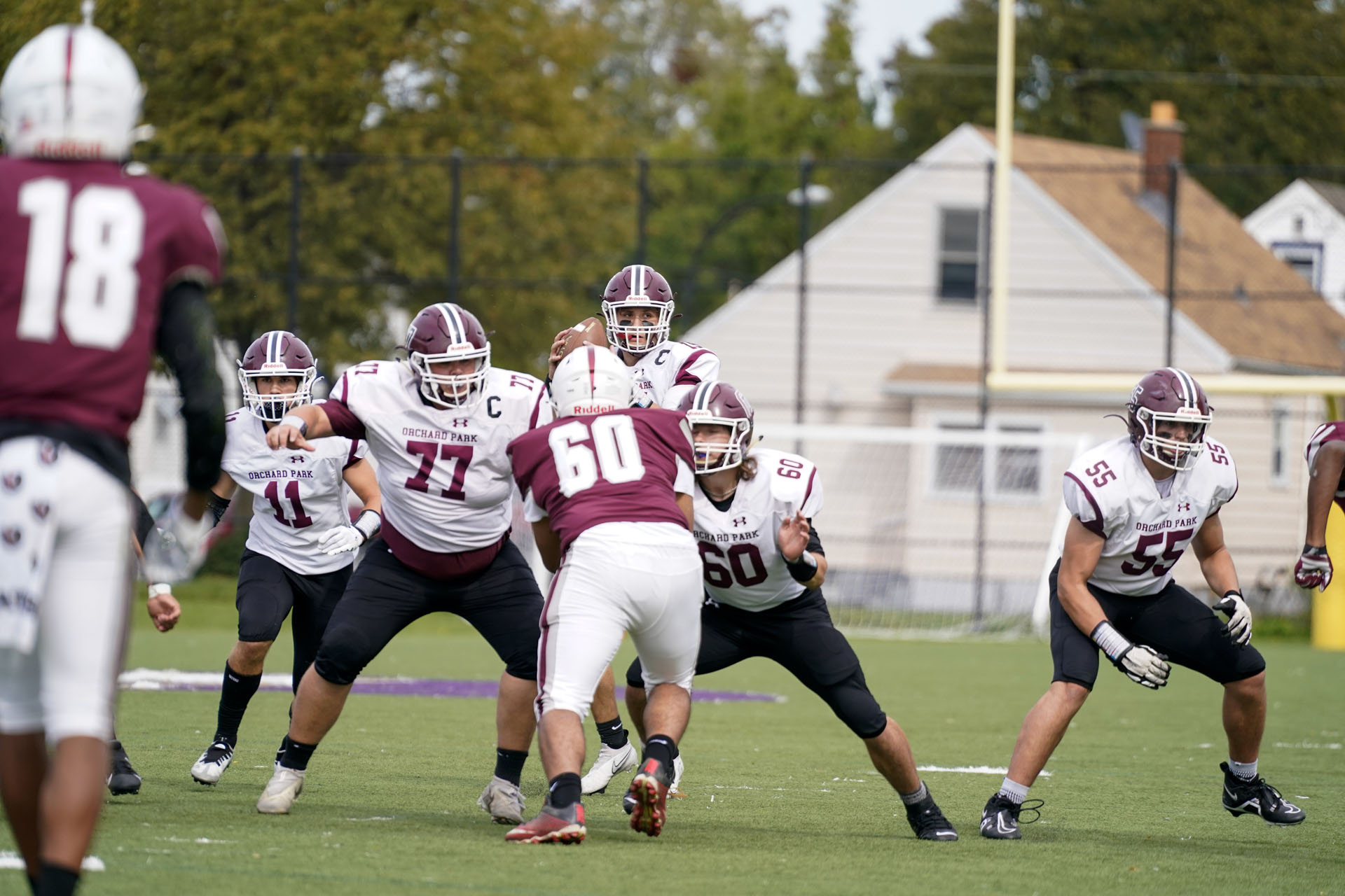 The Orchard Park offense running their play The Orchard Park offense running their play