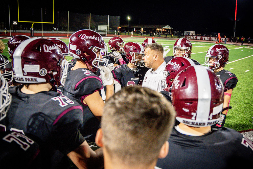 Coach talking to his squad during a timeout Coach talking to his squad during a timeout