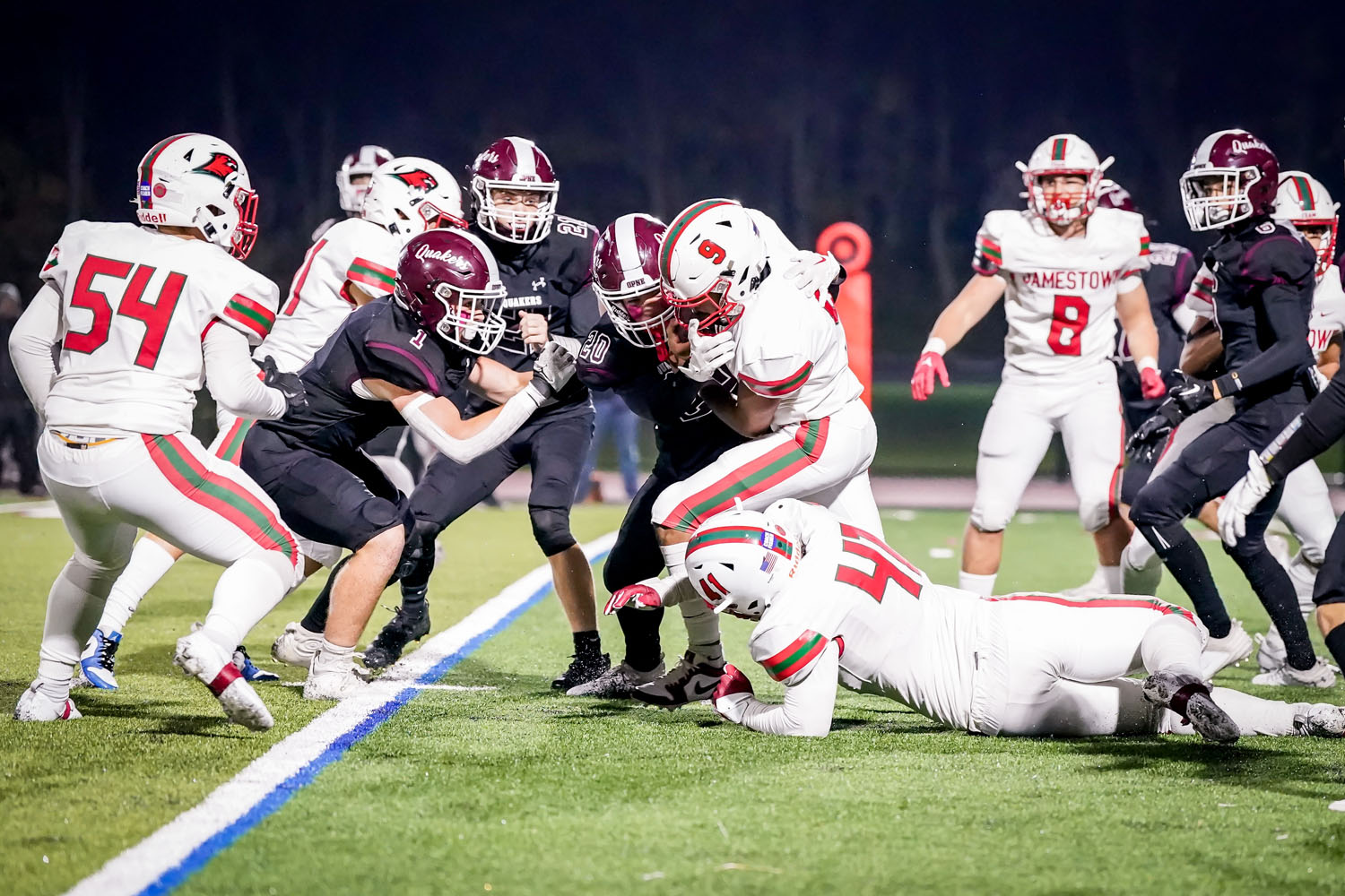 Quakers stopping the ball carrier Quakers stopping the ball carrier