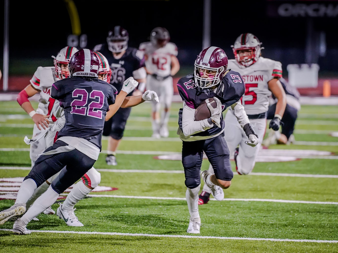 Wide Receiver turning and running with the ball Wide Receiver turning and running with the ball