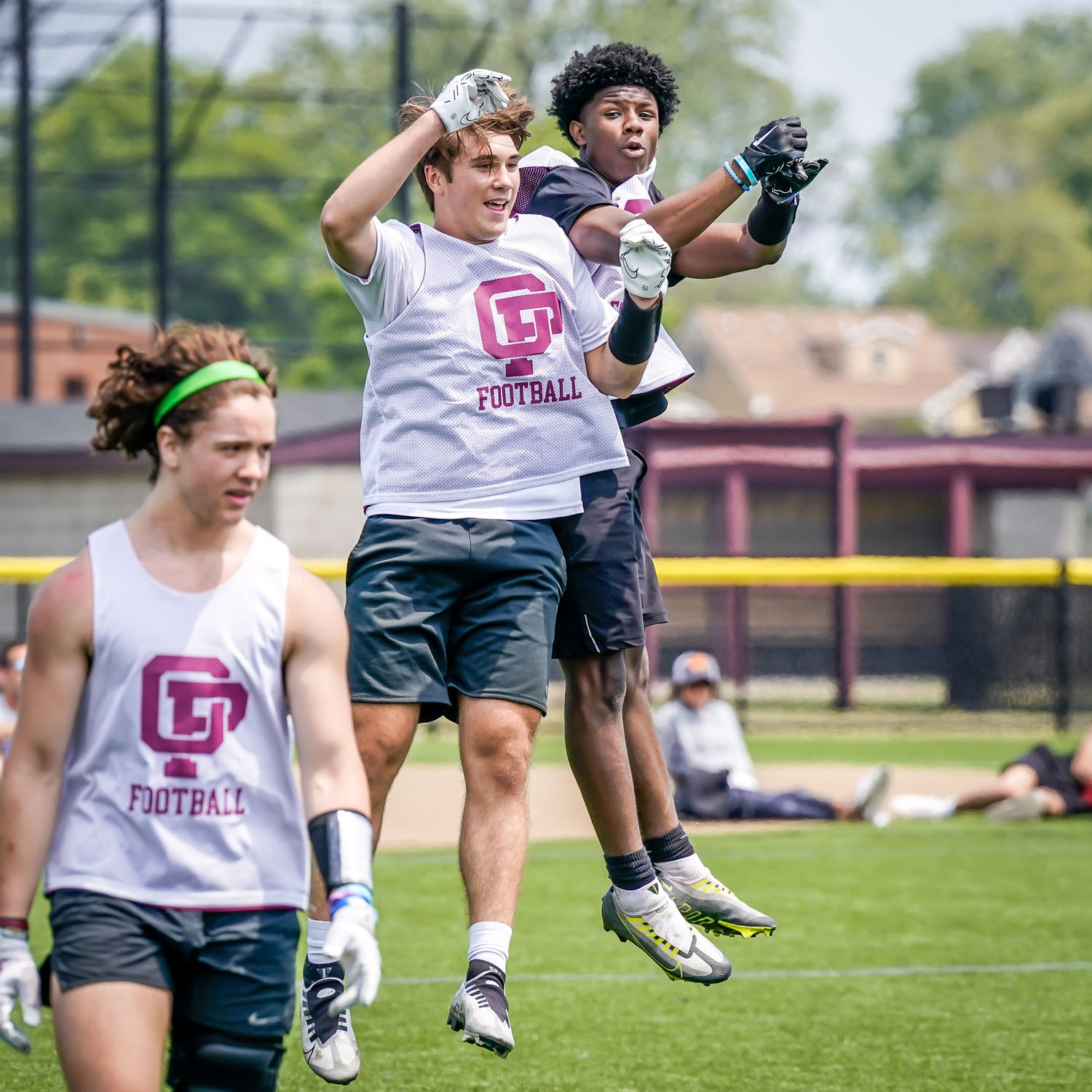Celebrating players on the Quakers team