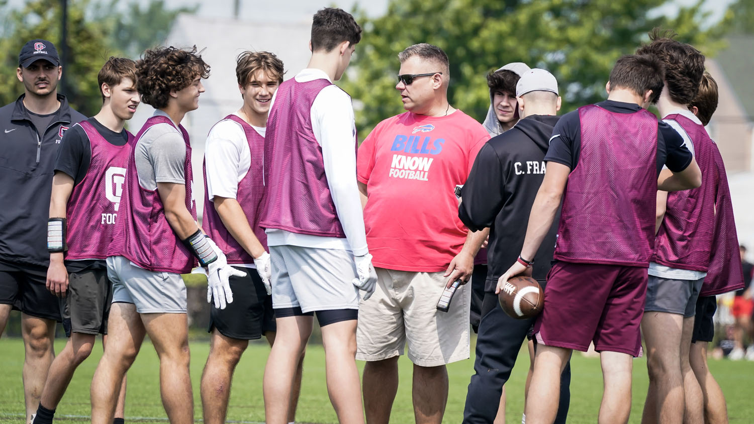 Coach talking to his team