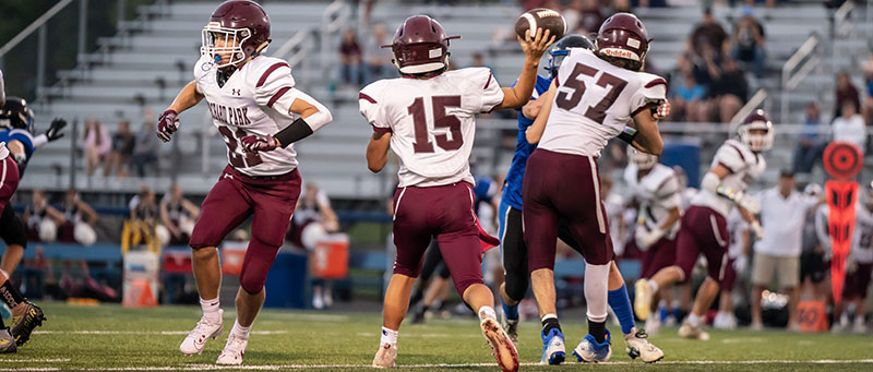 OP Celebrating the Win OP Quakerback throwing the
