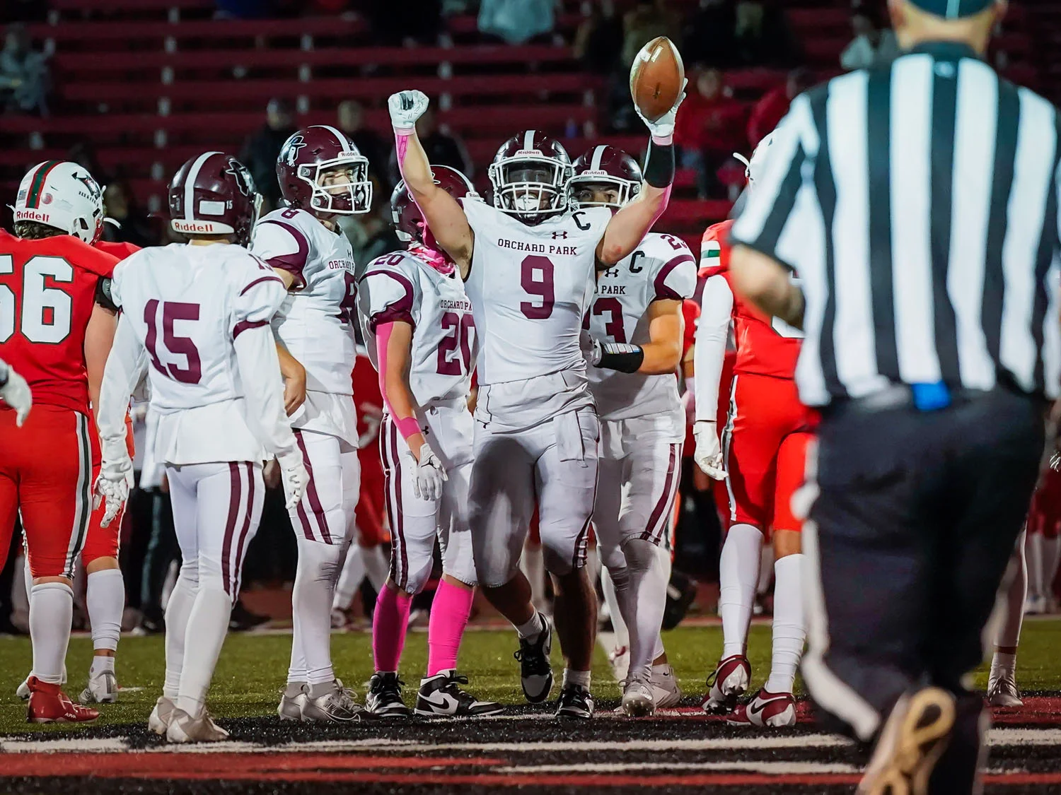 Taking the ball in celebration Taking the ball in celebration