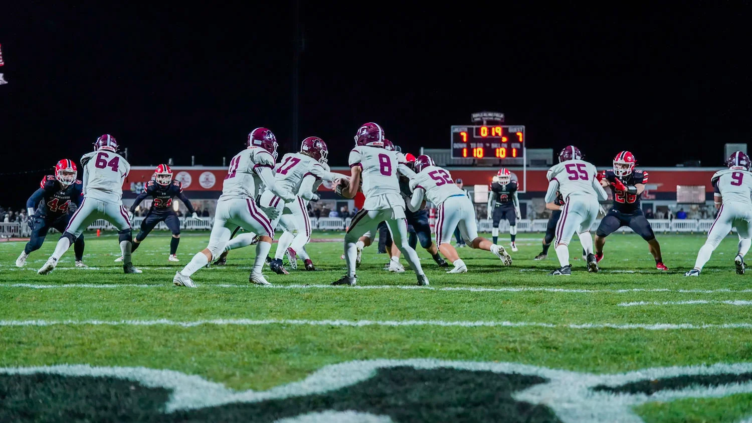 QB handing the ball off to the RB QB handing the ball off to the RB