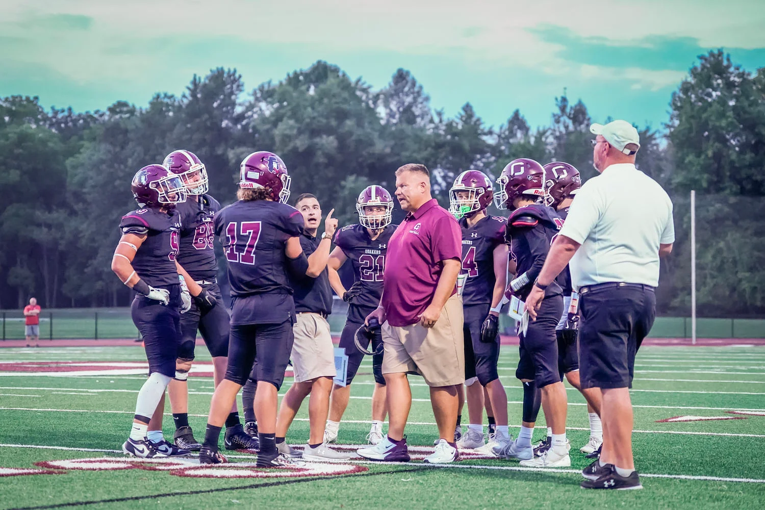Coach talking to the team