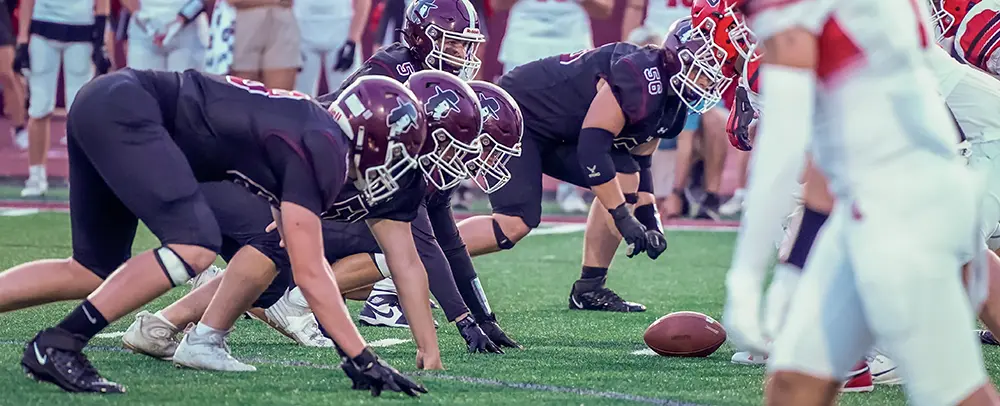 Quakers defensive line ready for the play Quakers defensive line ready for the play