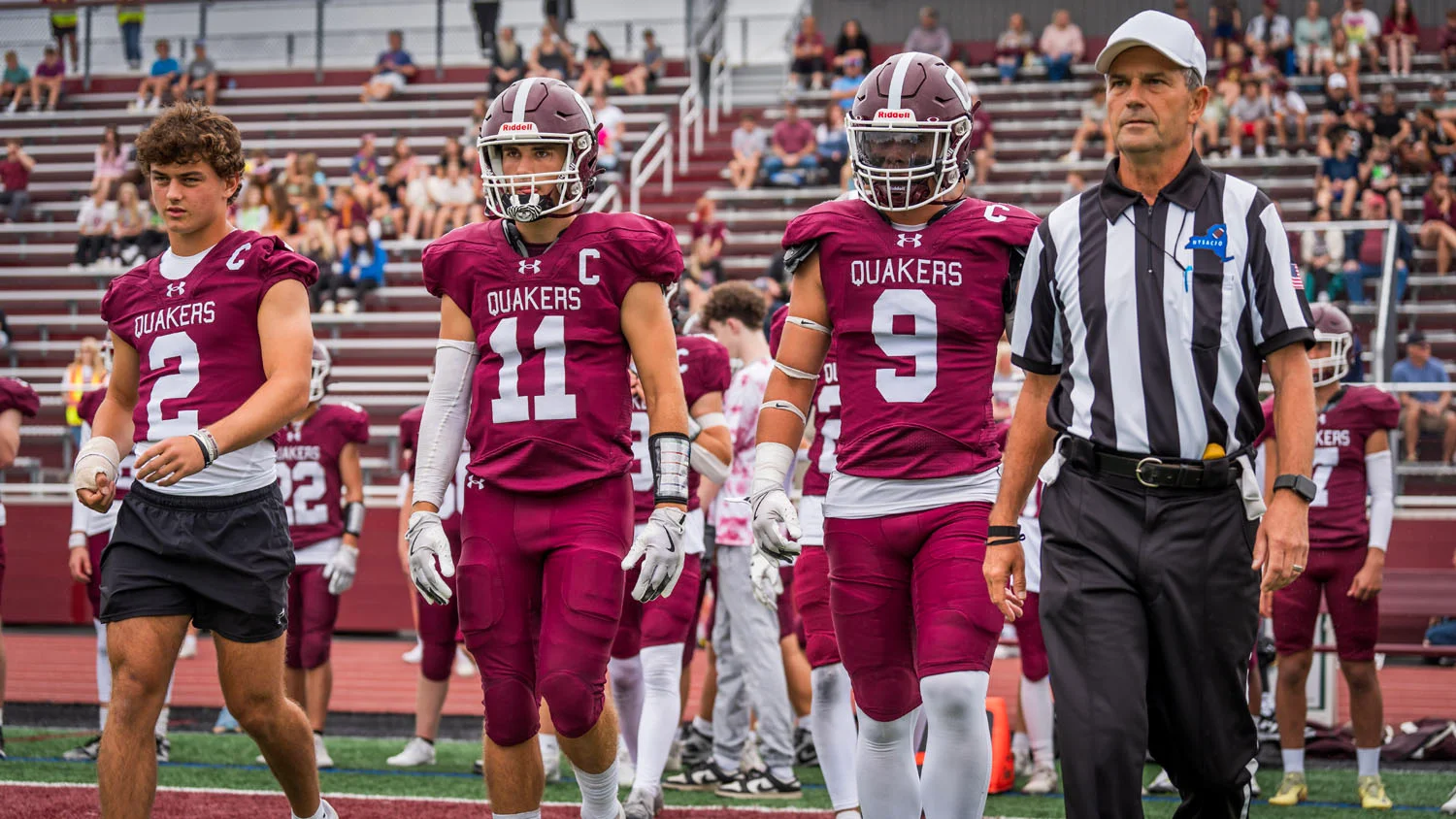 Captains heading to the coin toss Captains heading to the coin toss