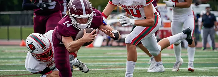 Orchard Park Quaker runner reaching for the endzone