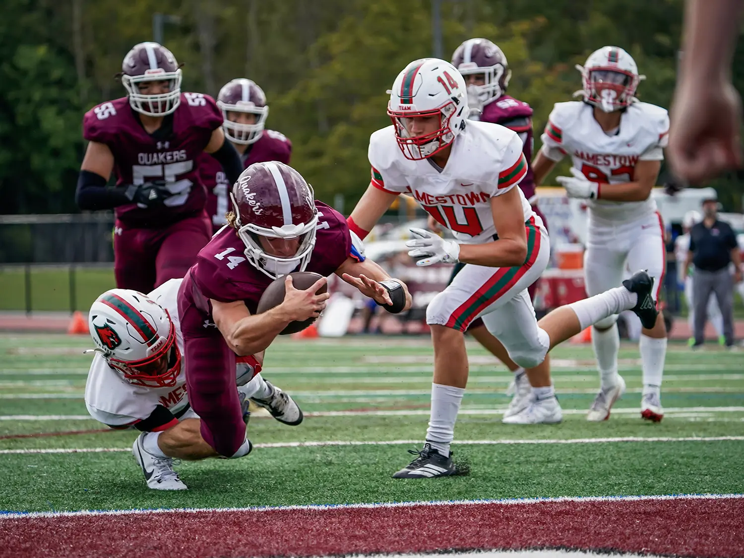 OP Runner reaching for the endzone